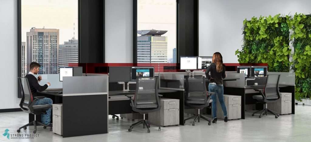 modern office cubicle with modular workstations with adjustable height desks in biophilic office