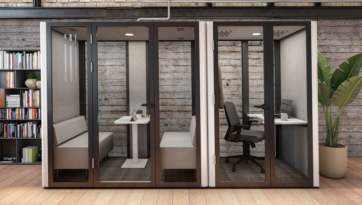 An acoustic collaborative office phone booth in a modern office design
