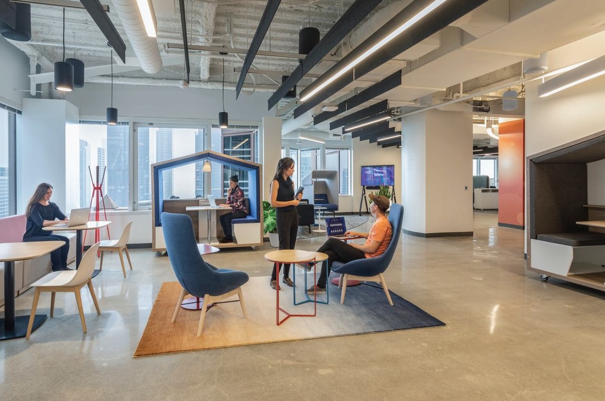 flexible office space with meeting spaces and booths in and open layout