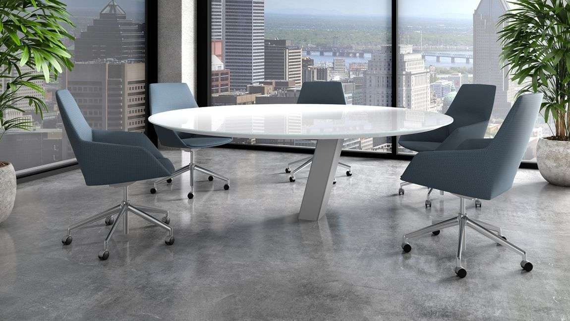 conference table in a modern office with a biophilic design and natural light 