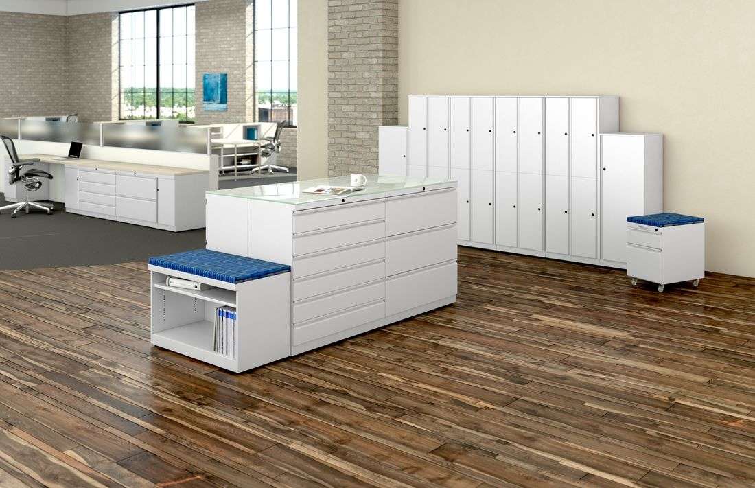 Multiple white office storage solutions for a modern office with lots of space.
